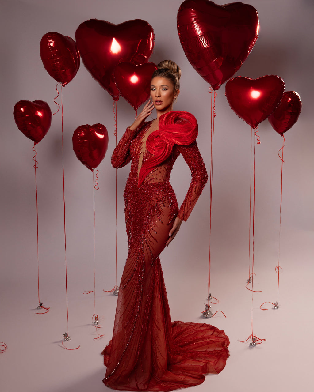 Long Beaded Gown with Sculptural Shoulder Detail