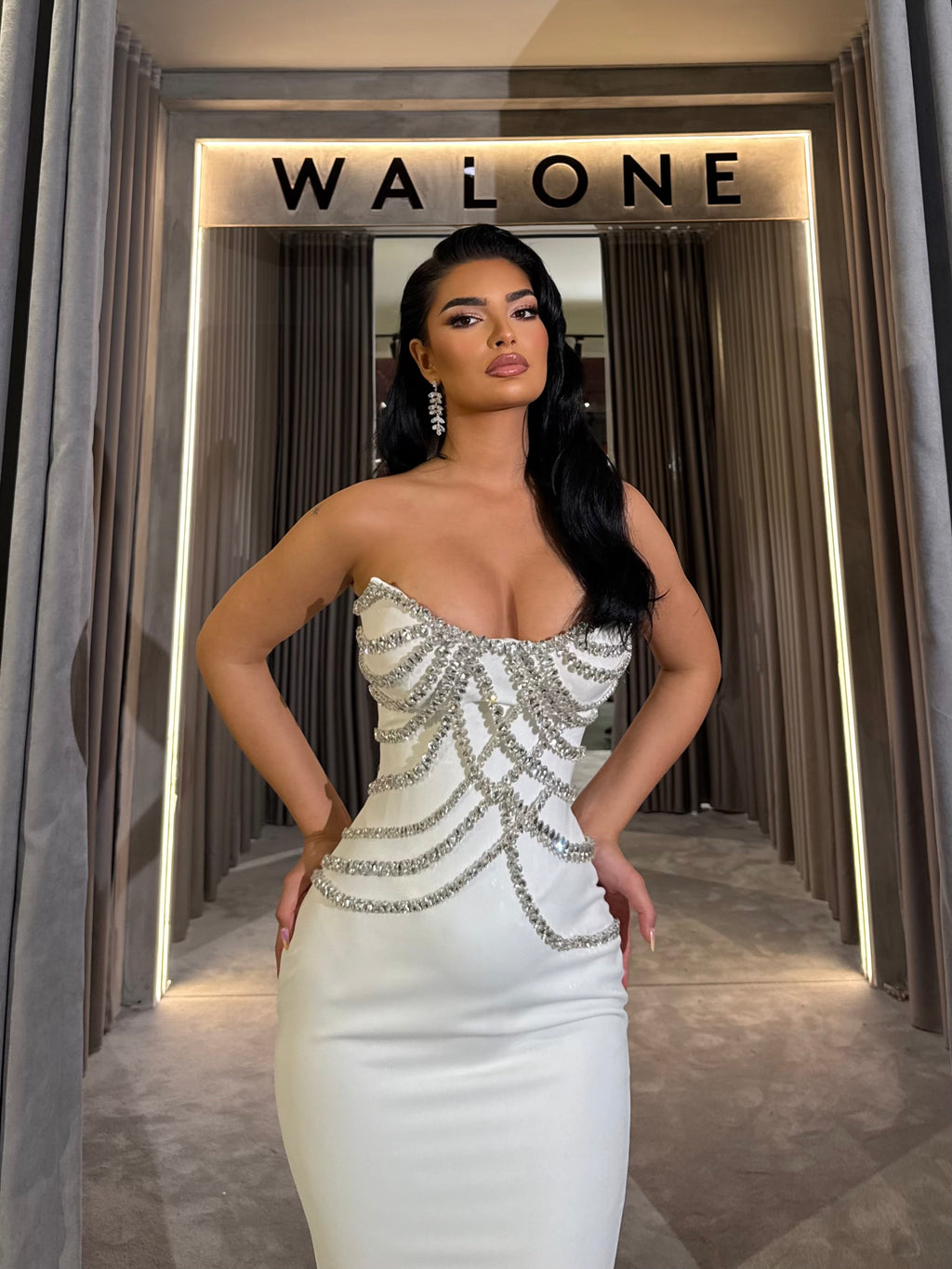 Long dress with crystal embellished bodice and satin mermaid train