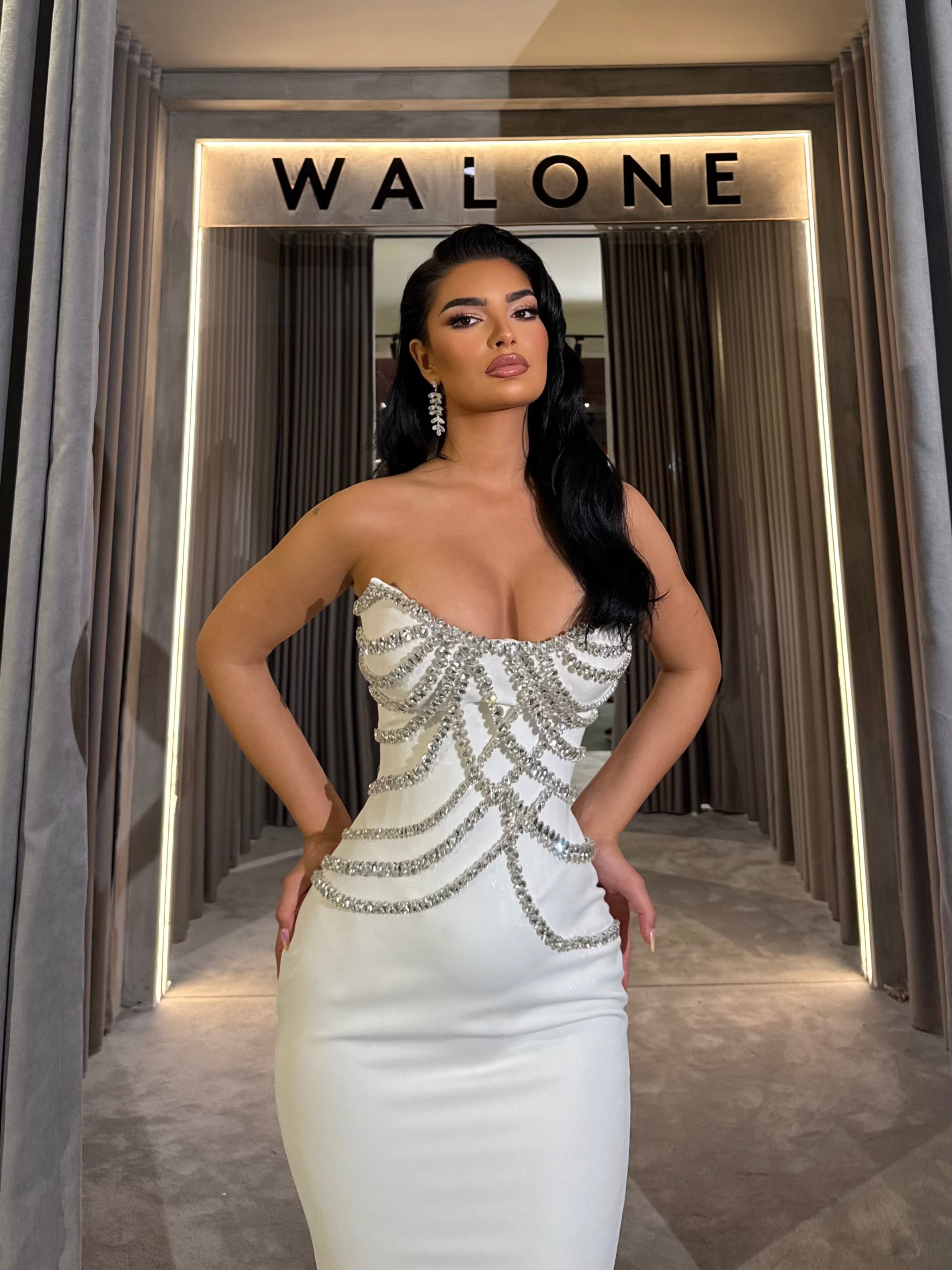 Long dress with crystal embellished bodice and satin mermaid train