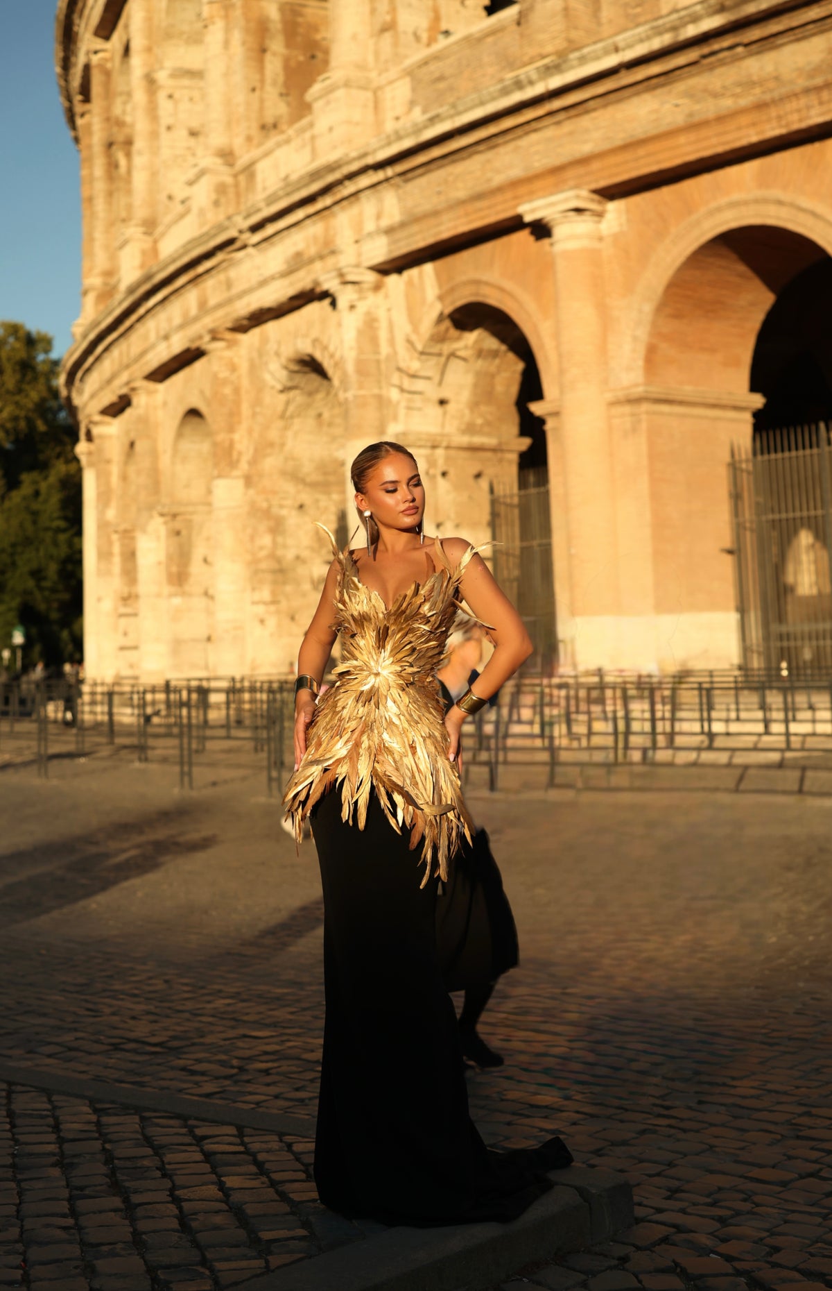 Carolina - feather peplum gown