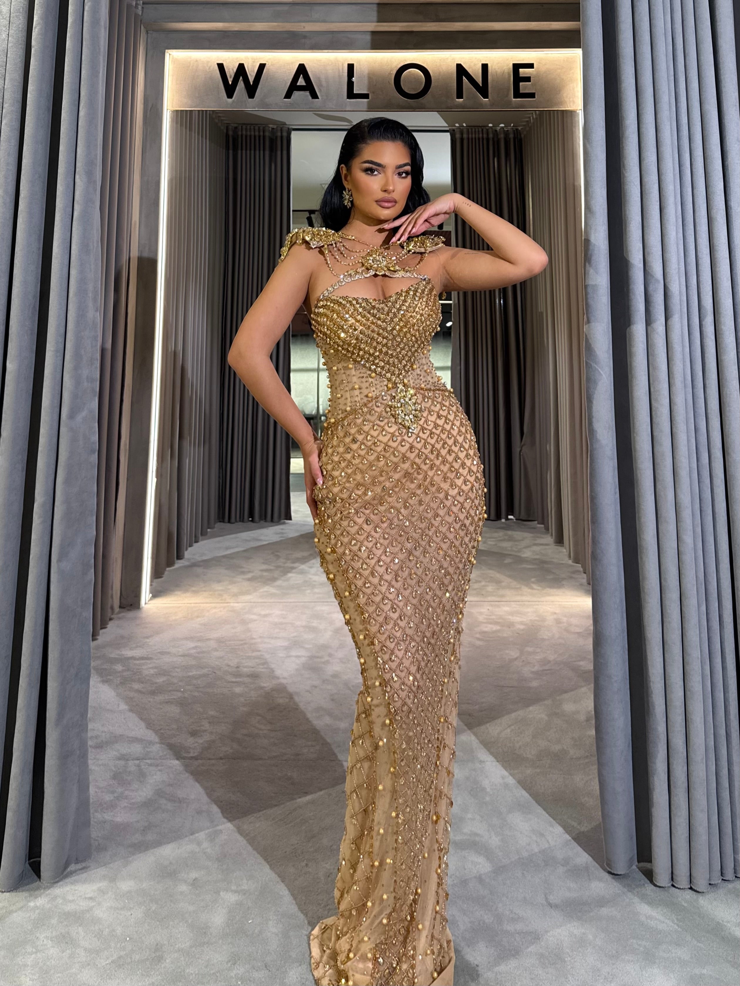Long dress with golden crystal lattice and sculpted neckline