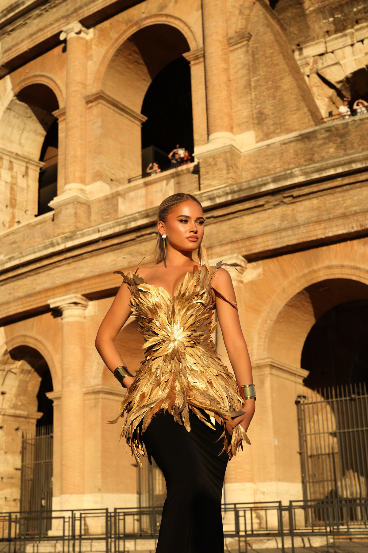 Carolina - feather peplum gown
