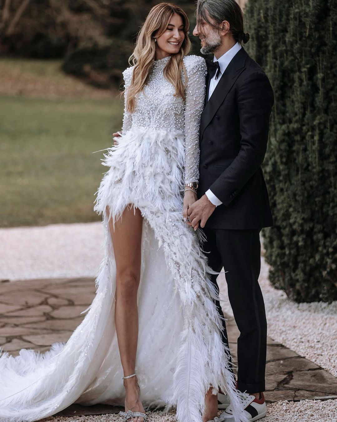 High Neck White Pearl Dress with Feathered Skirt