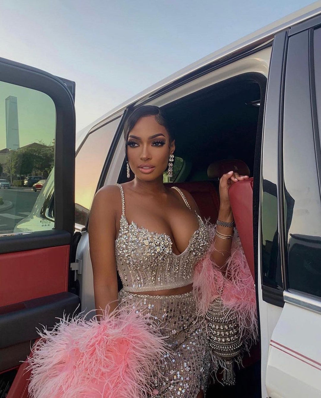 TWO-PIECE SEQUIN SILVER SET WITH PINK FEATHERED SHORT CAPE