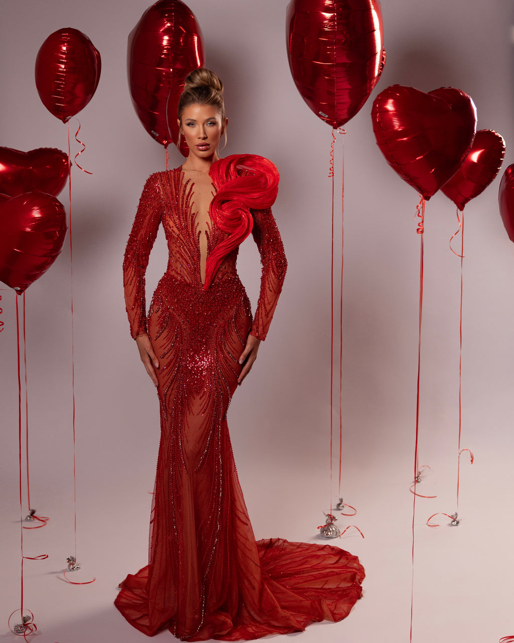 Long Beaded Gown with Sculptural Shoulder Detail