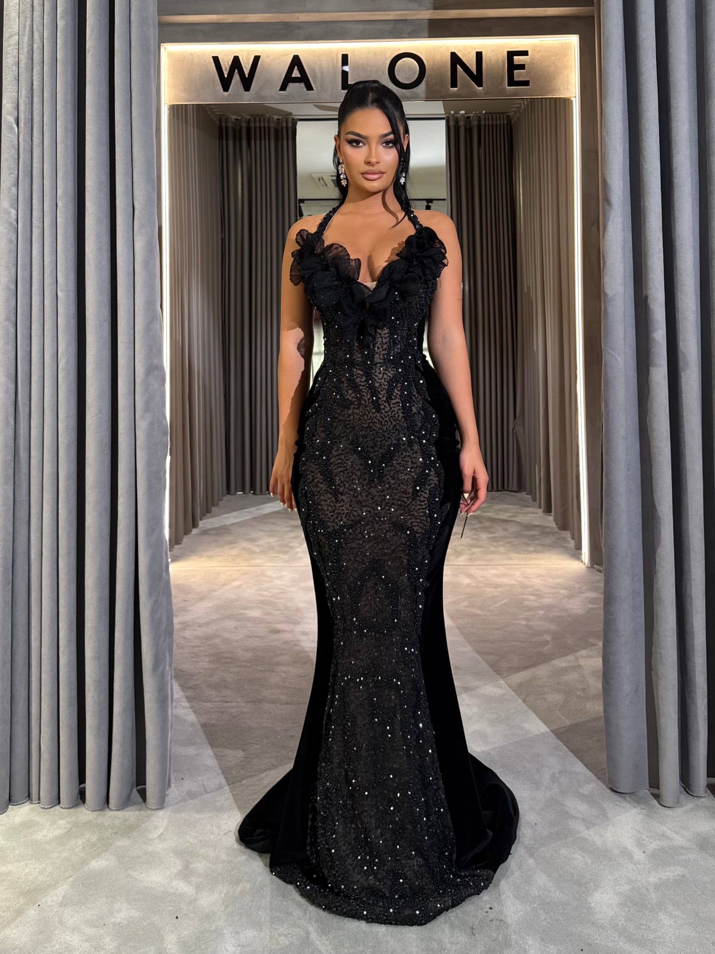 Black Sequin Gown with Ruffle Halter Detailing