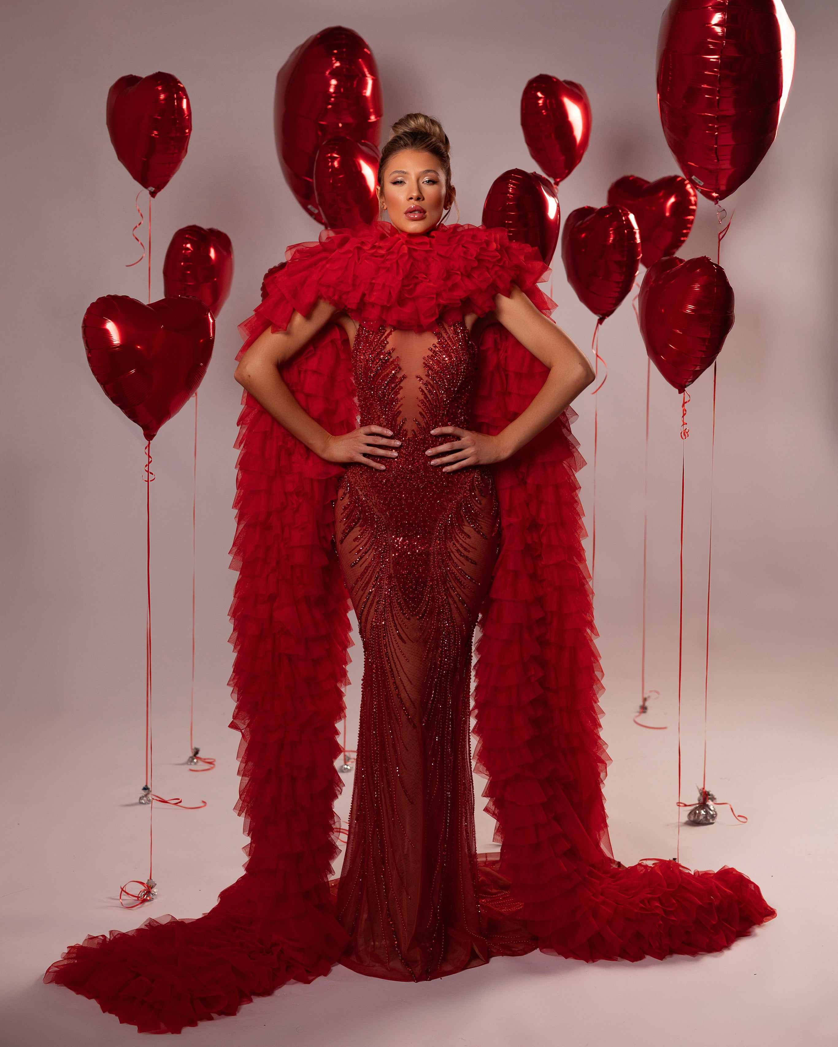 Long Beaded Ruffled Cape Gown