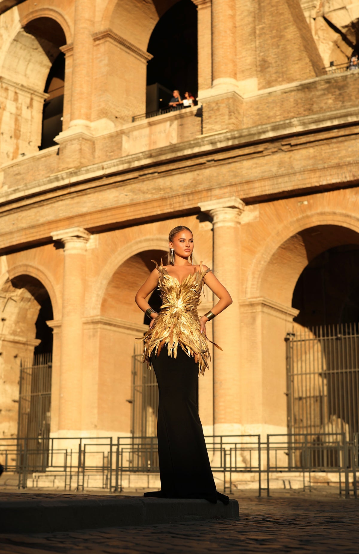 Carolina - feather peplum gown