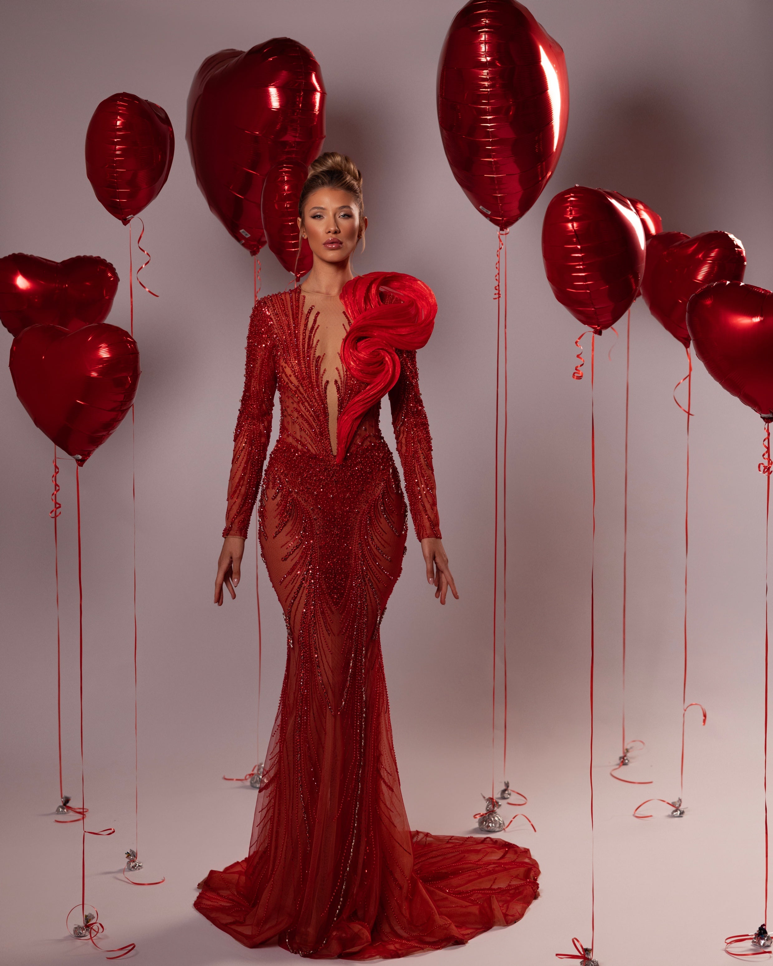 Long Beaded Gown with Sculptural Shoulder Detail