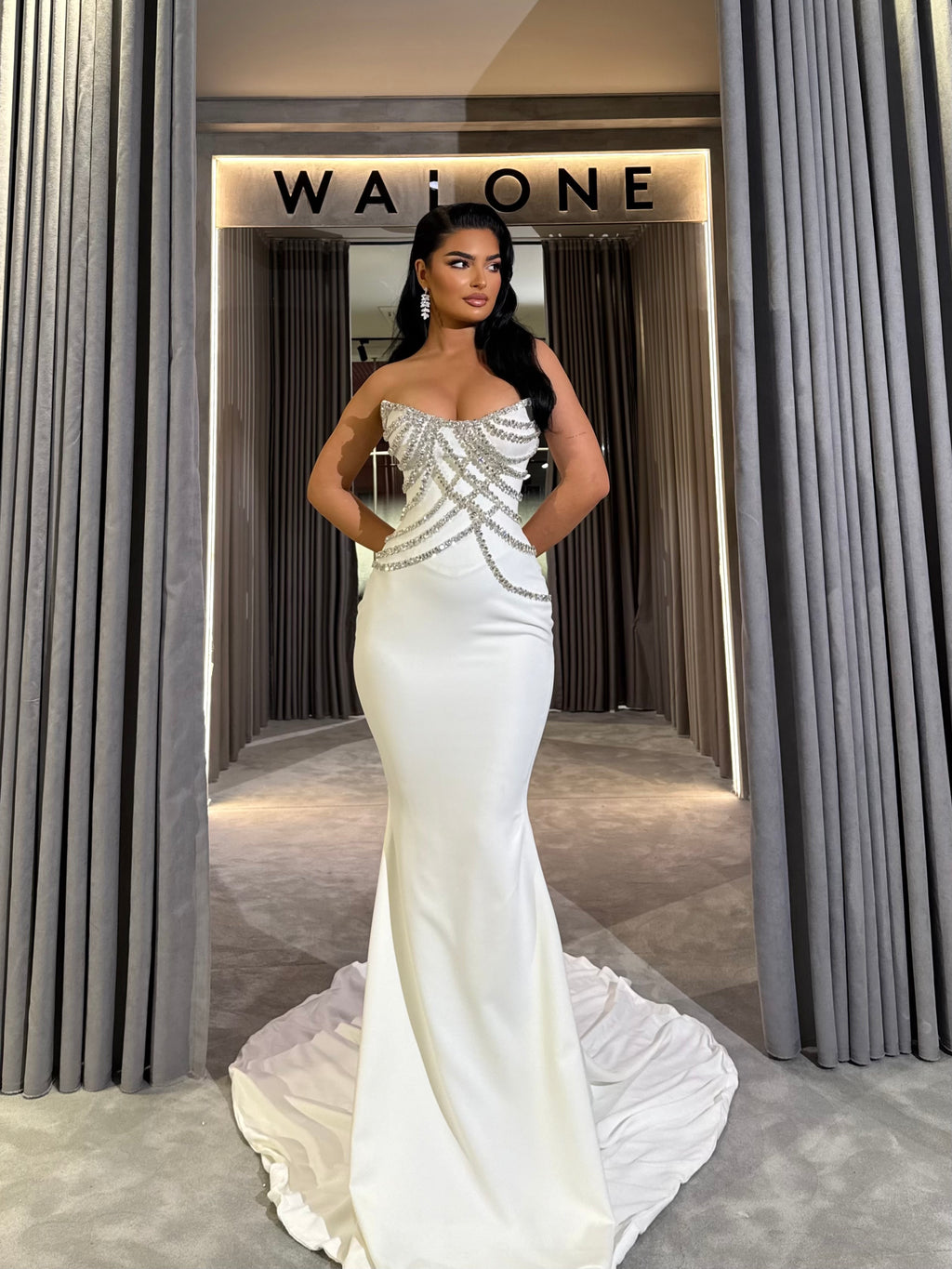 Long dress with crystal embellished bodice and satin mermaid train