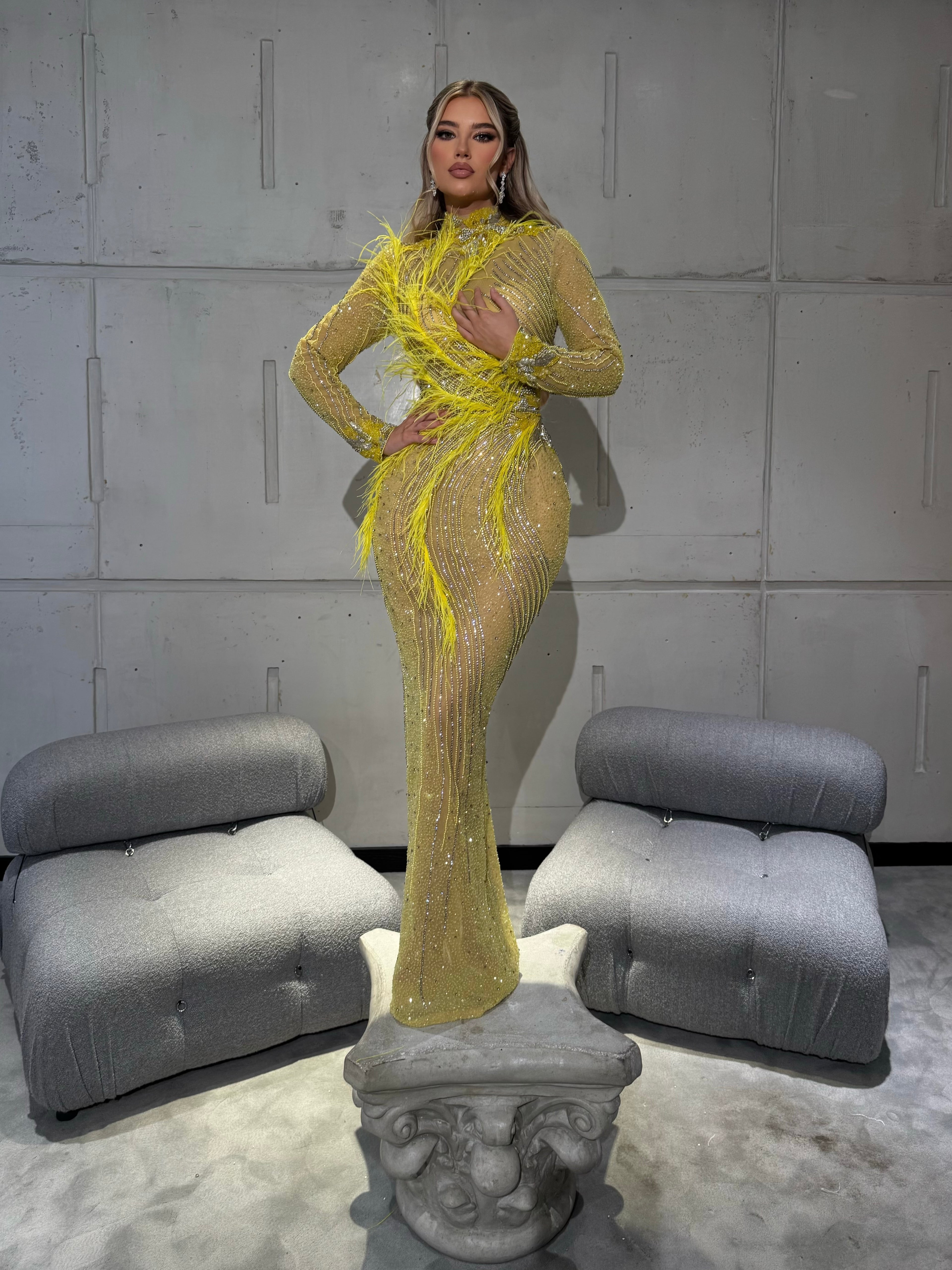 Yellow Gown with Feather Accents