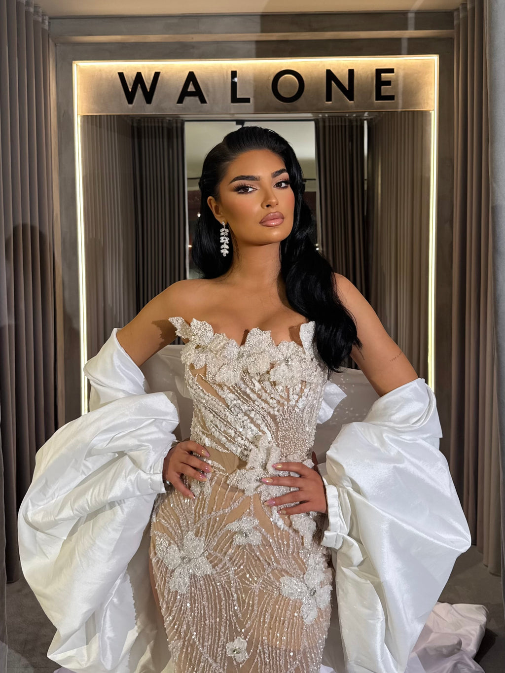 Long dress with 3D floral appliqués and sheer crystal detailing