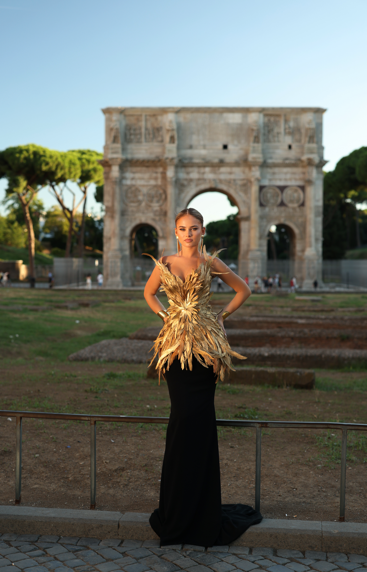 Carolina - feather peplum gown