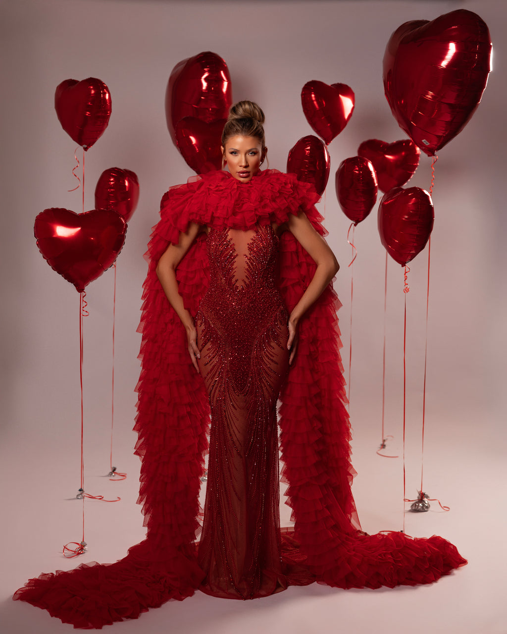 Long Beaded Ruffled Cape Gown