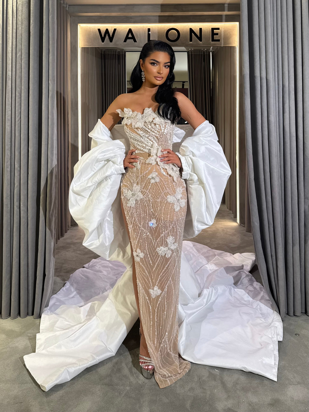 Long dress with 3D floral appliqués and sheer crystal detailing