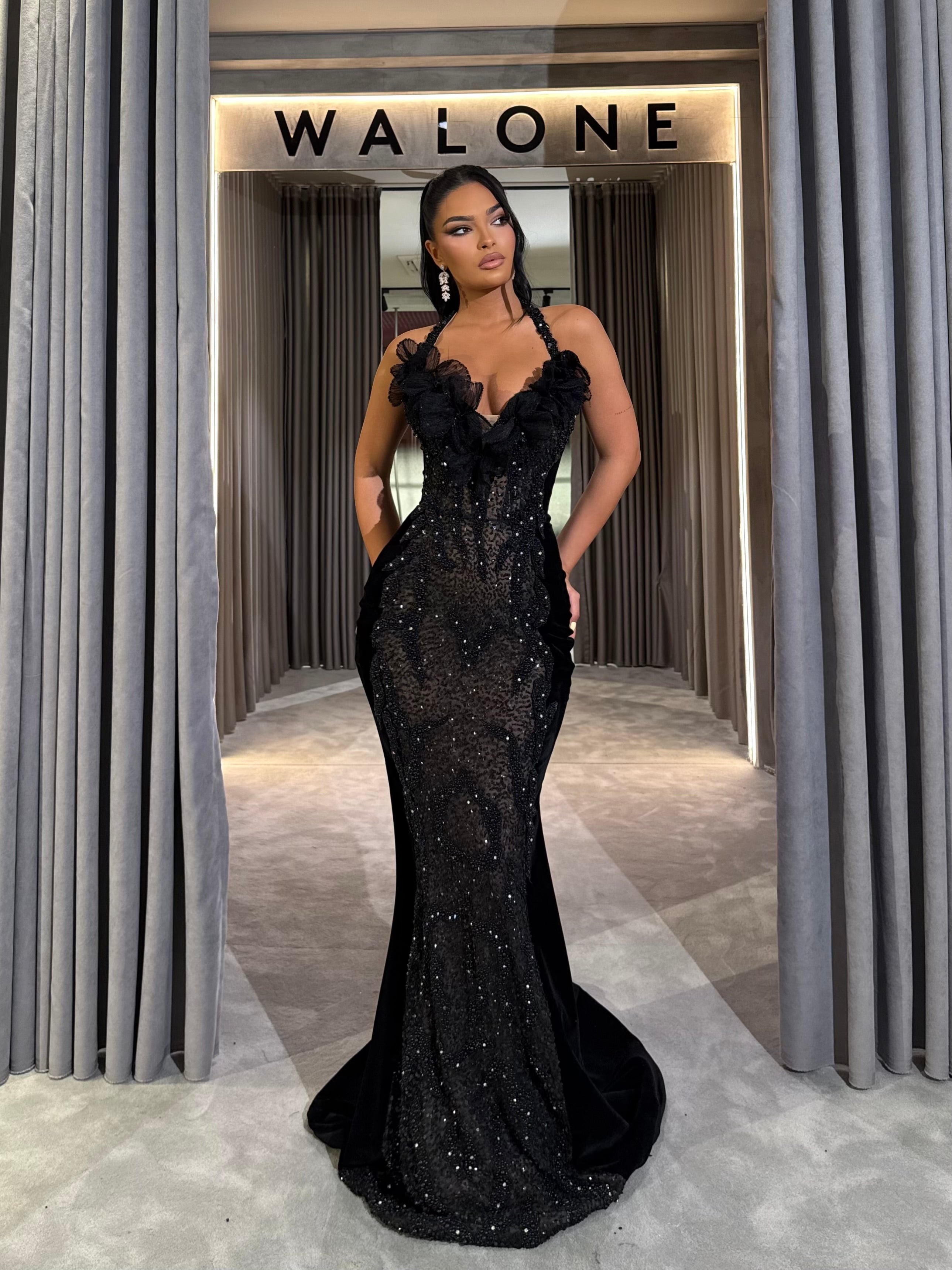 Black Sequin Gown with Ruffle Halter Detailing