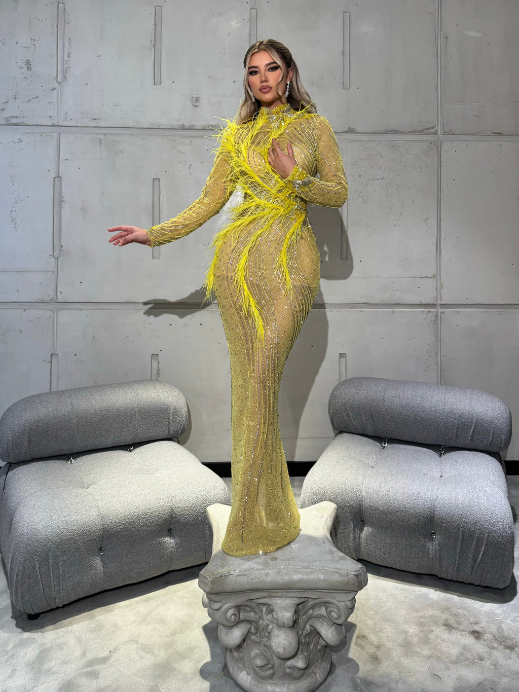 Yellow Gown with Feather Accents