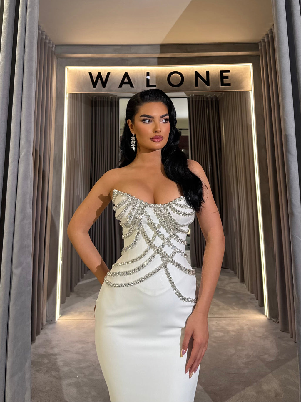 Long dress with crystal embellished bodice and satin mermaid train