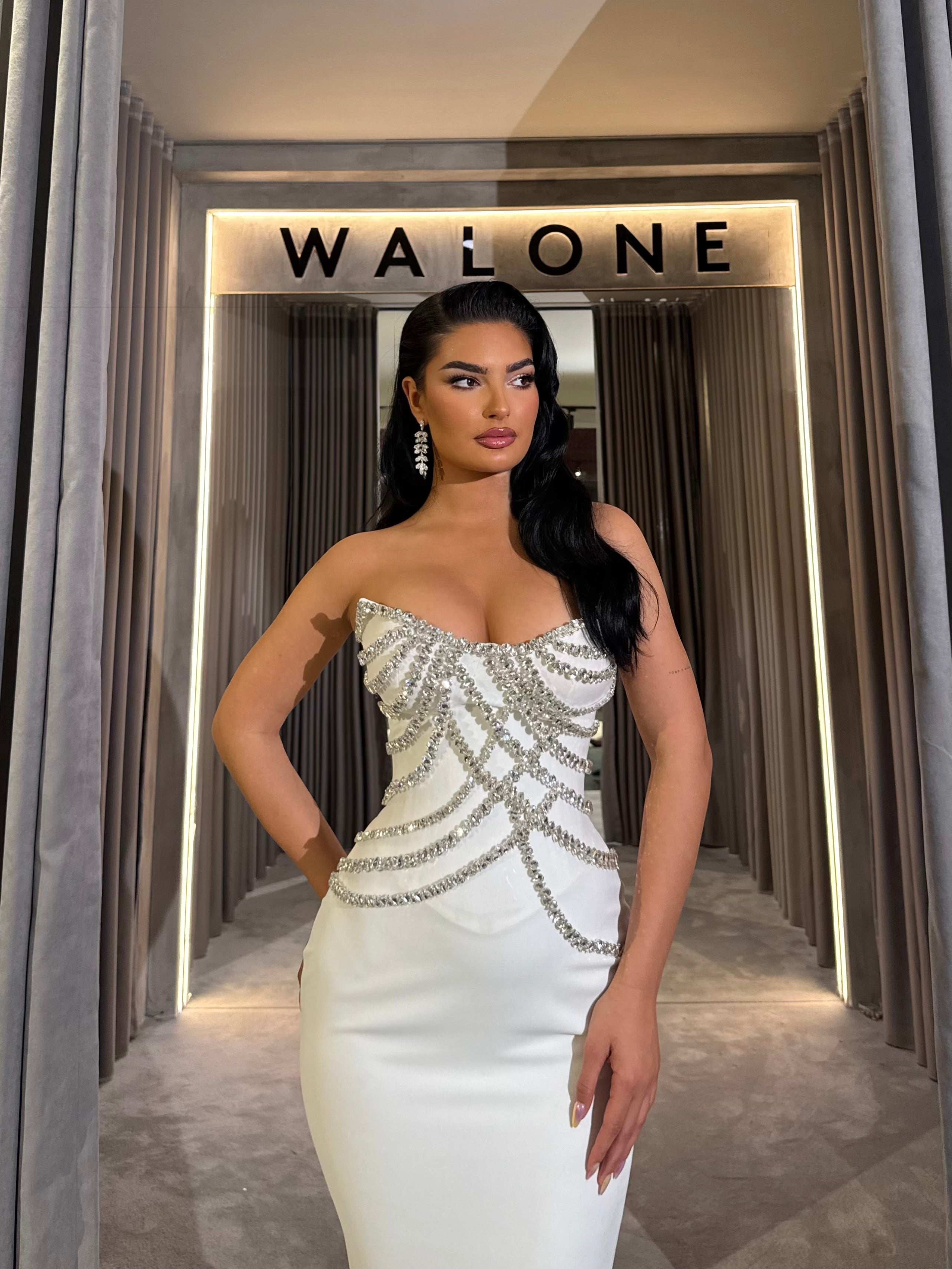 Long dress with crystal embellished bodice and satin mermaid train