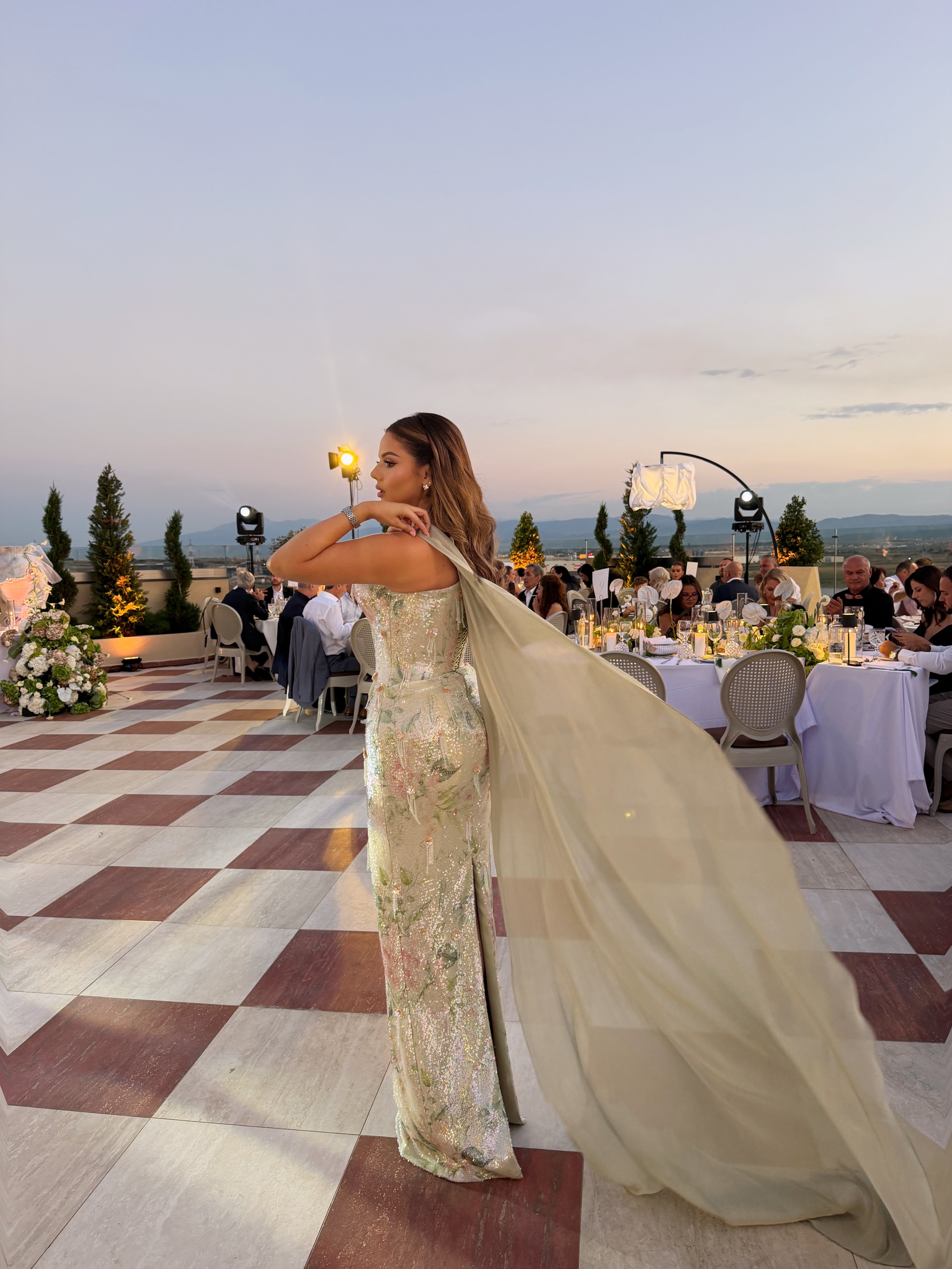 Ajla - Embellished one shoulder cape gown