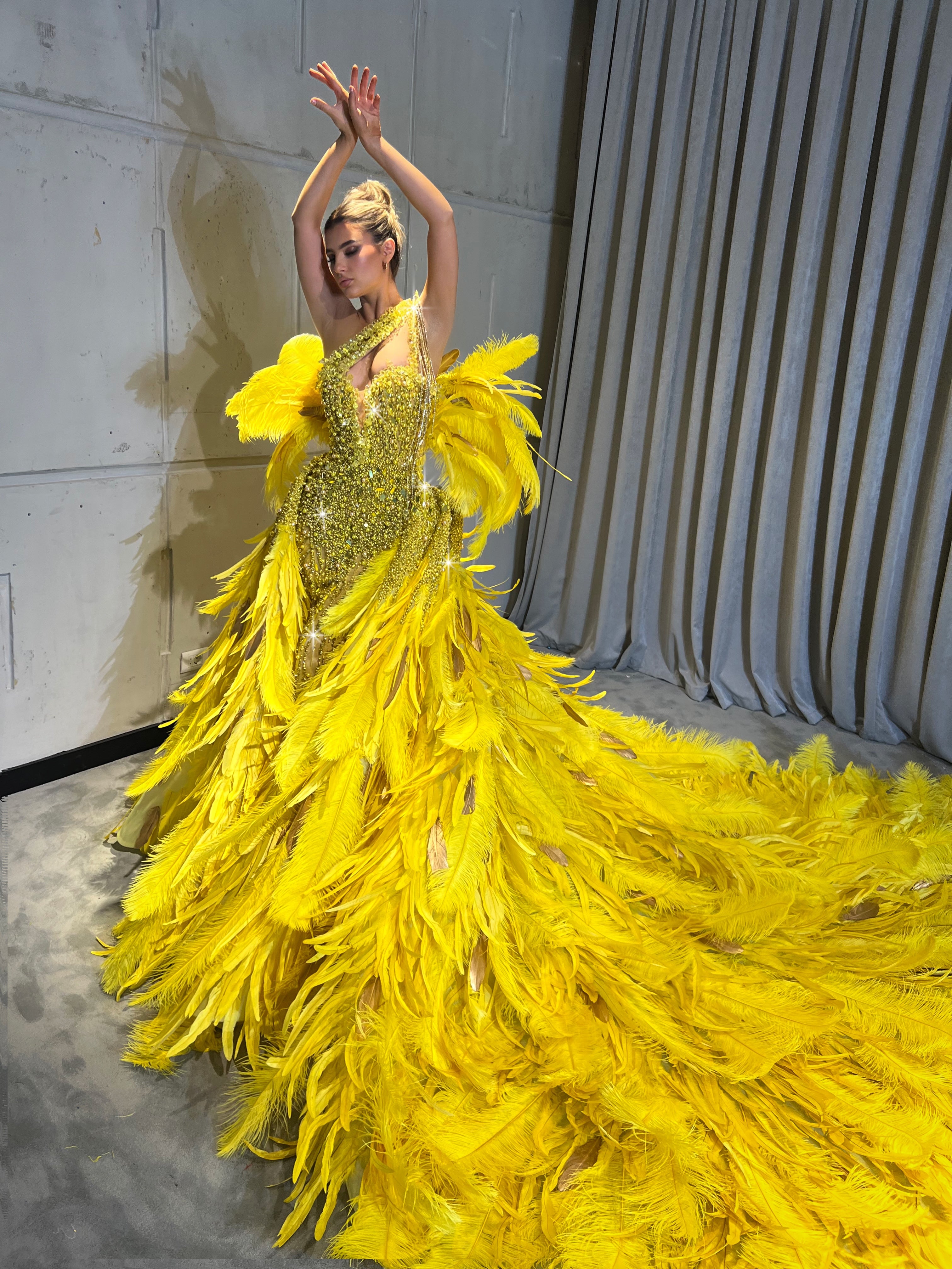 Khalia with feathered train