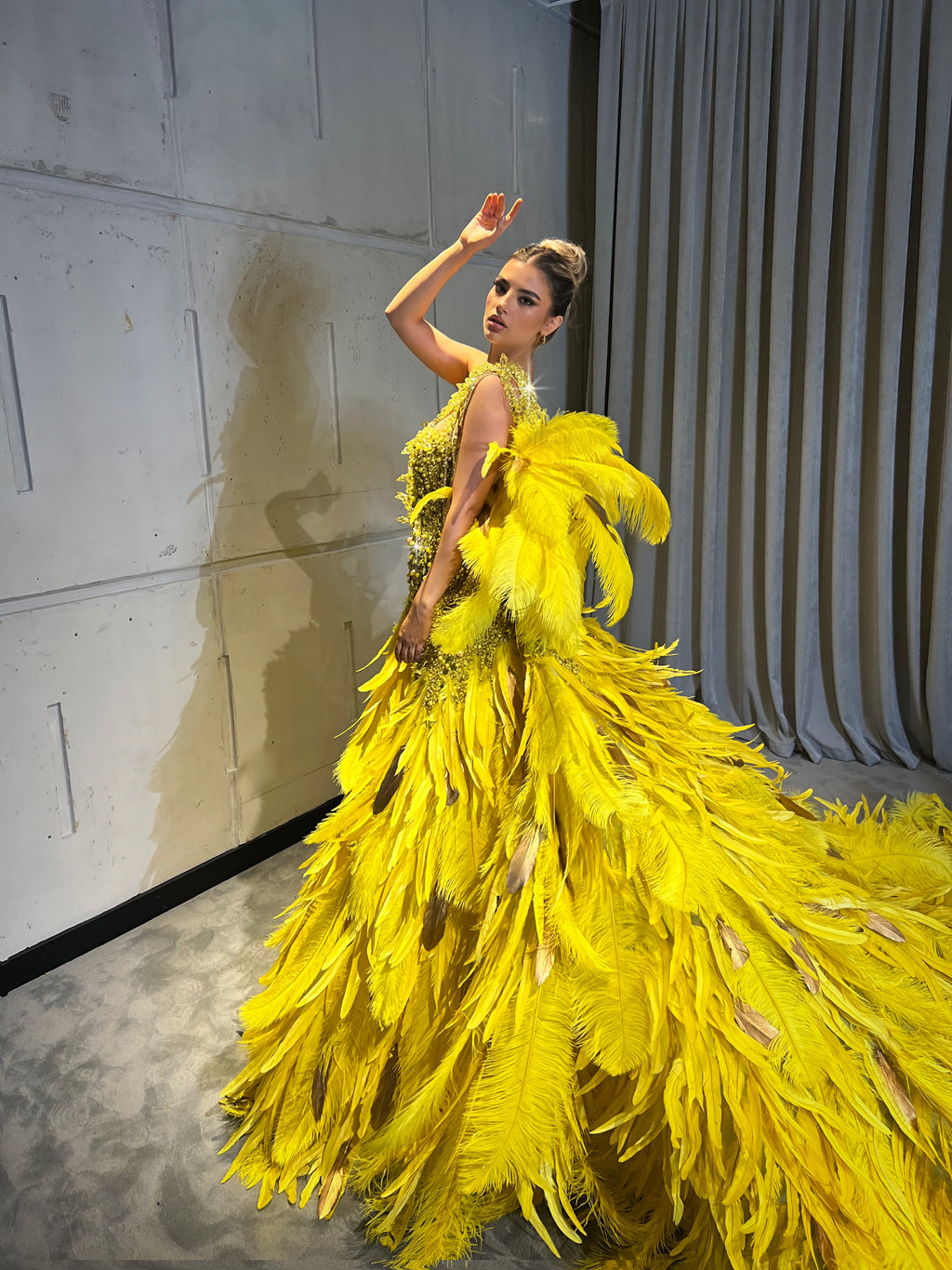 Khalia with feathered train