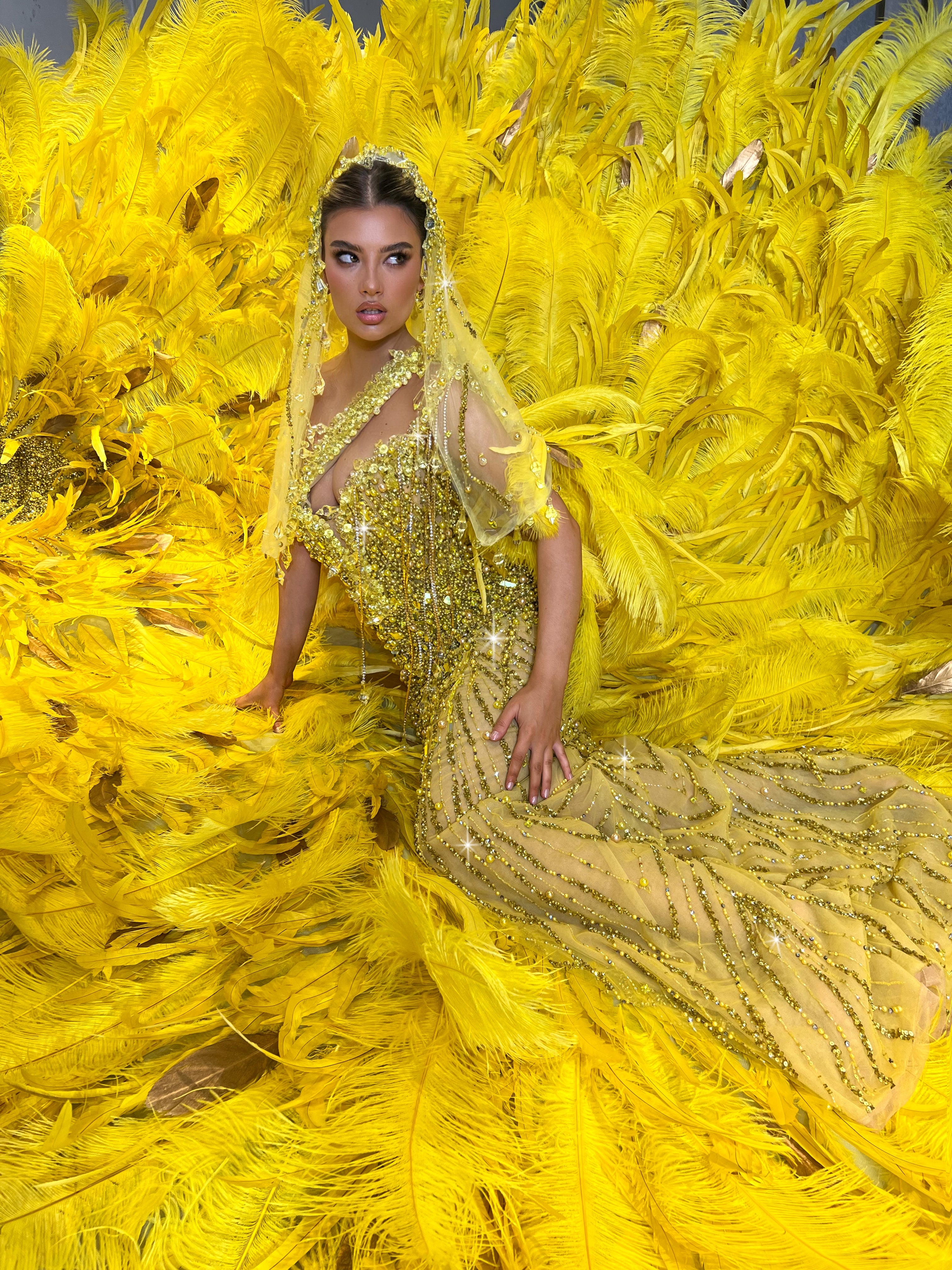 Khalia with feathered train