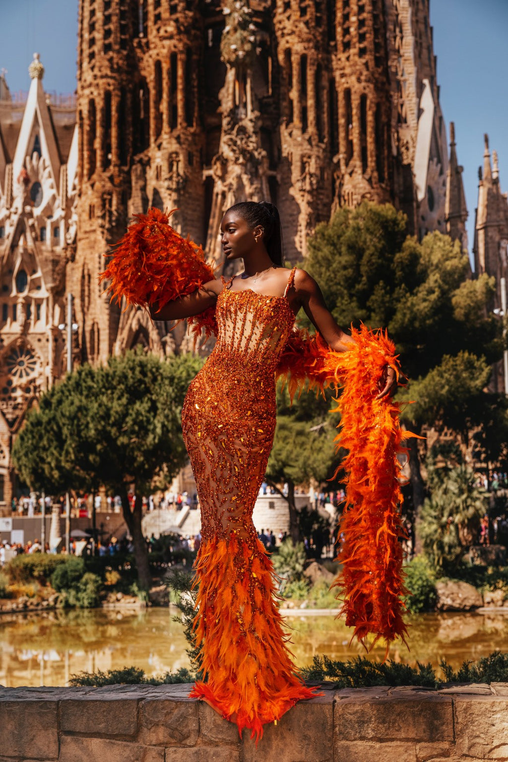 Orange Adorned Dress with Feathered Cape