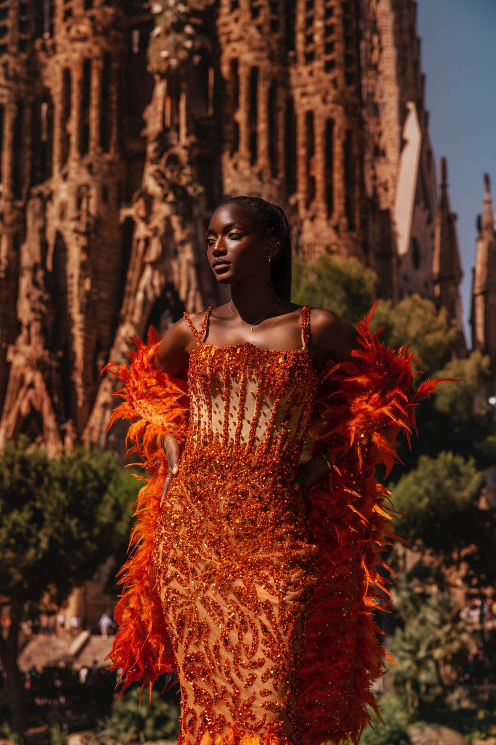 Orange Adorned Dress with Feathered Cape
