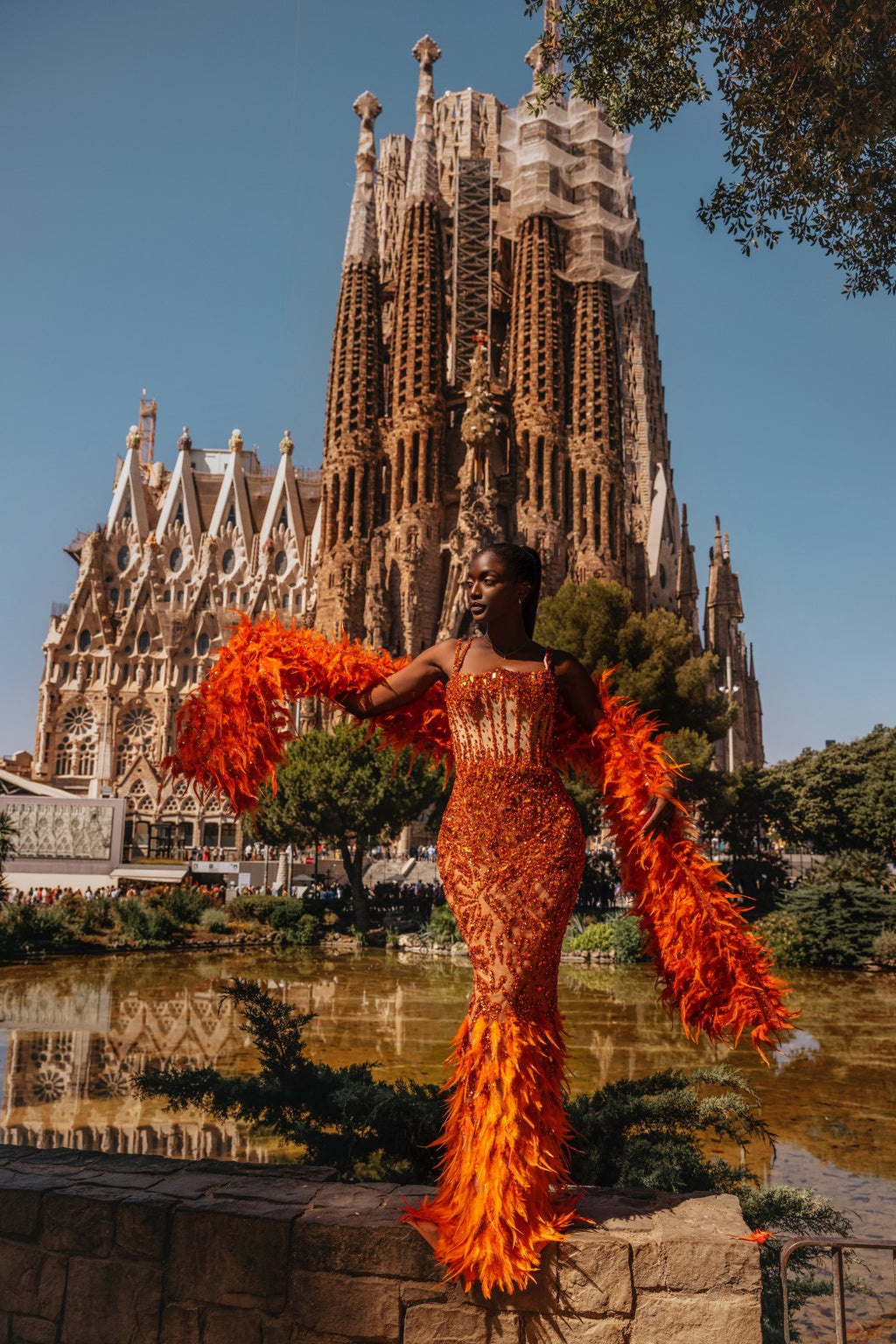 Orange Adorned Dress with Feathered Cape