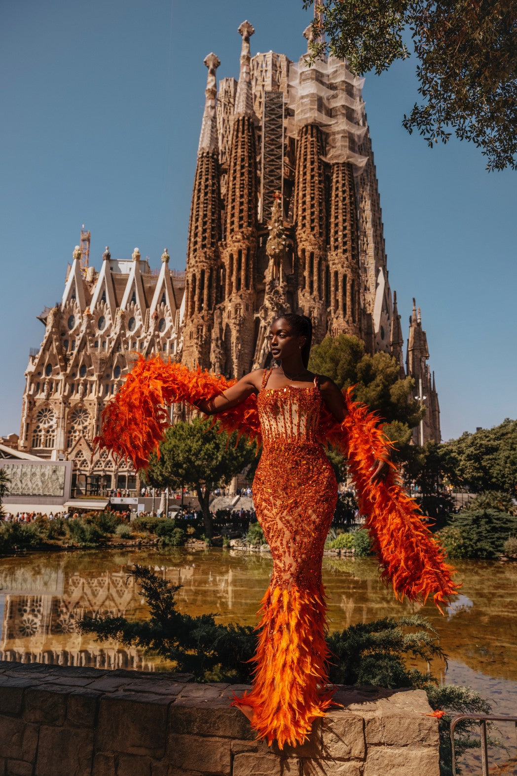 Orange Adorned Dress with Feathered Cape