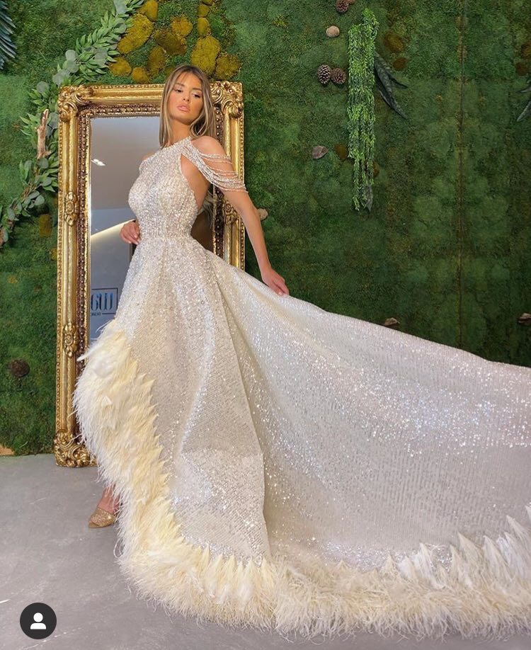 Sleeveless Shimmering Feathered Ball Gown