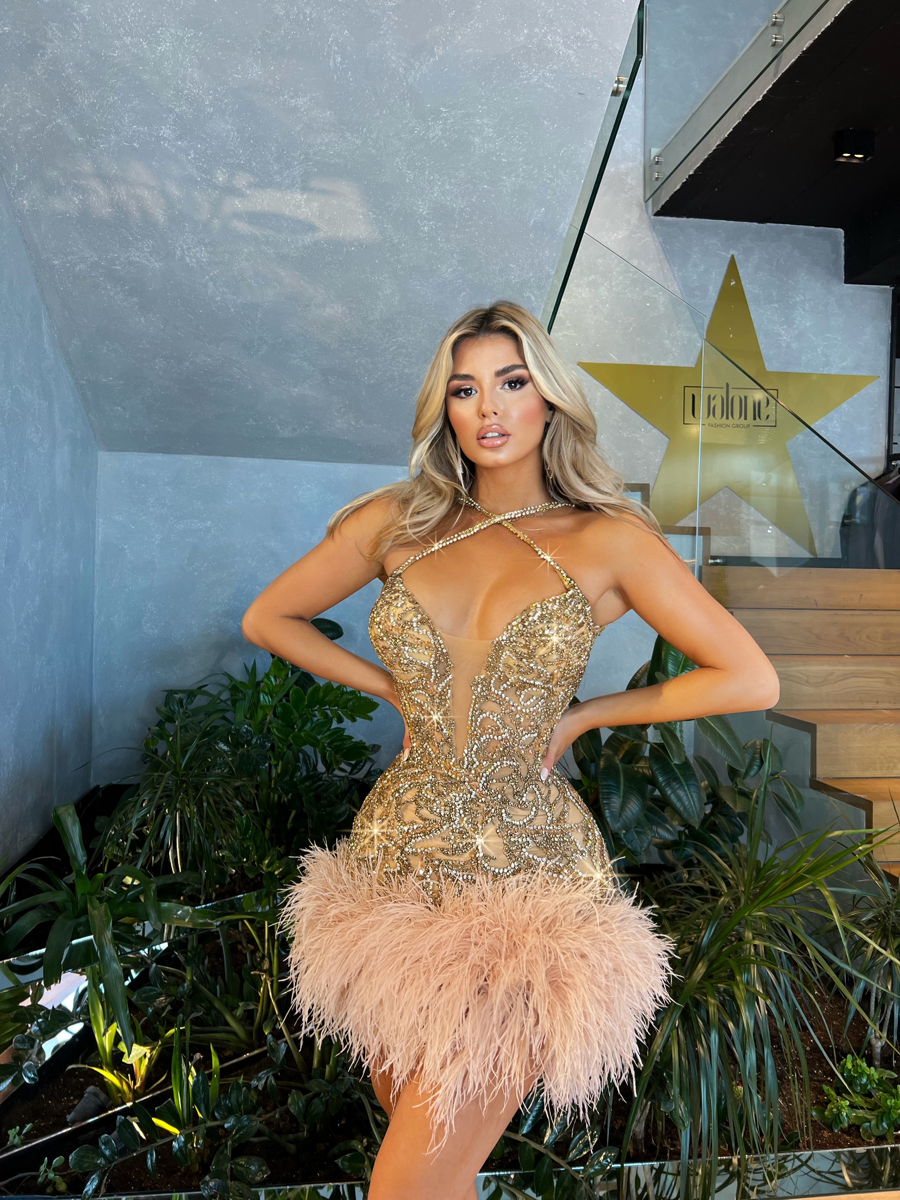 gold feather dress Felicia Rose-Gold Gala XL Gilded Feather Sequin Evening Gown boasts elegant feather straps and accents at the bottom of the gown X-Strap Gold Feathered Short Dress